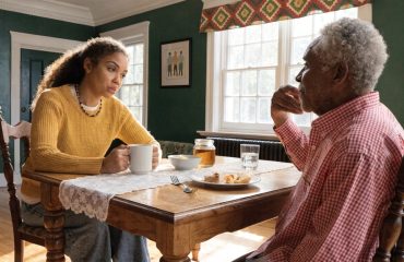 old man with huntington's disease and caregiver